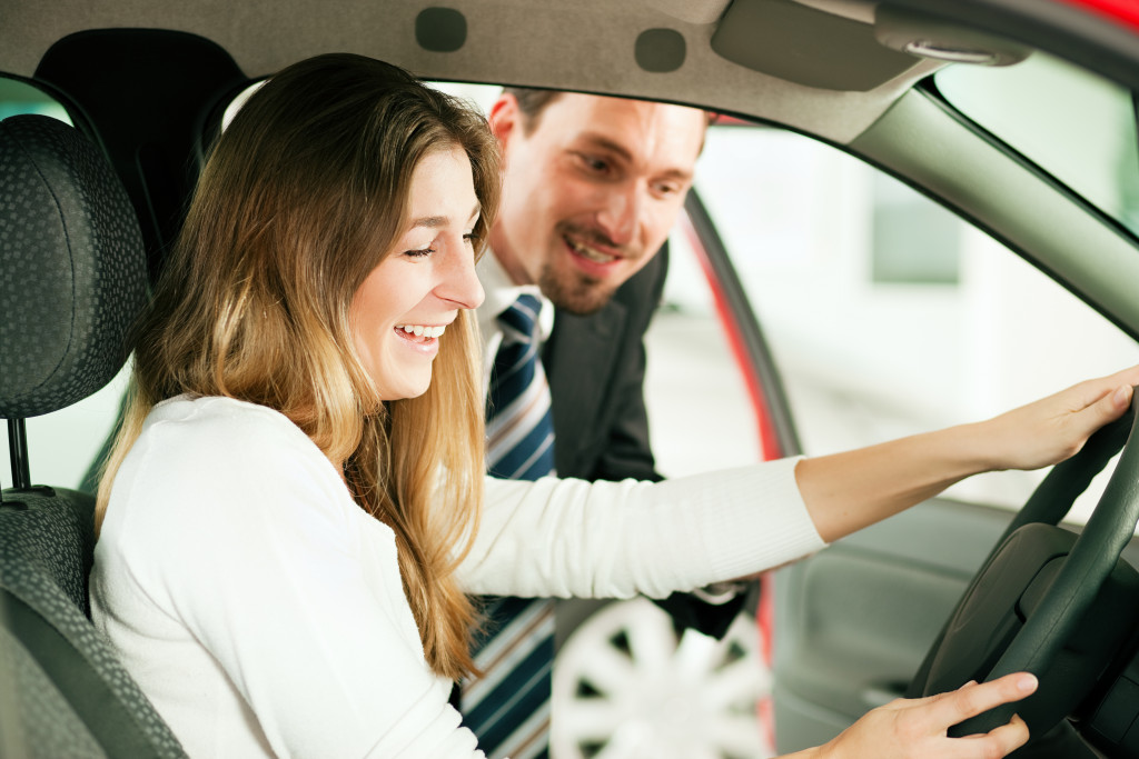 woman buying a car