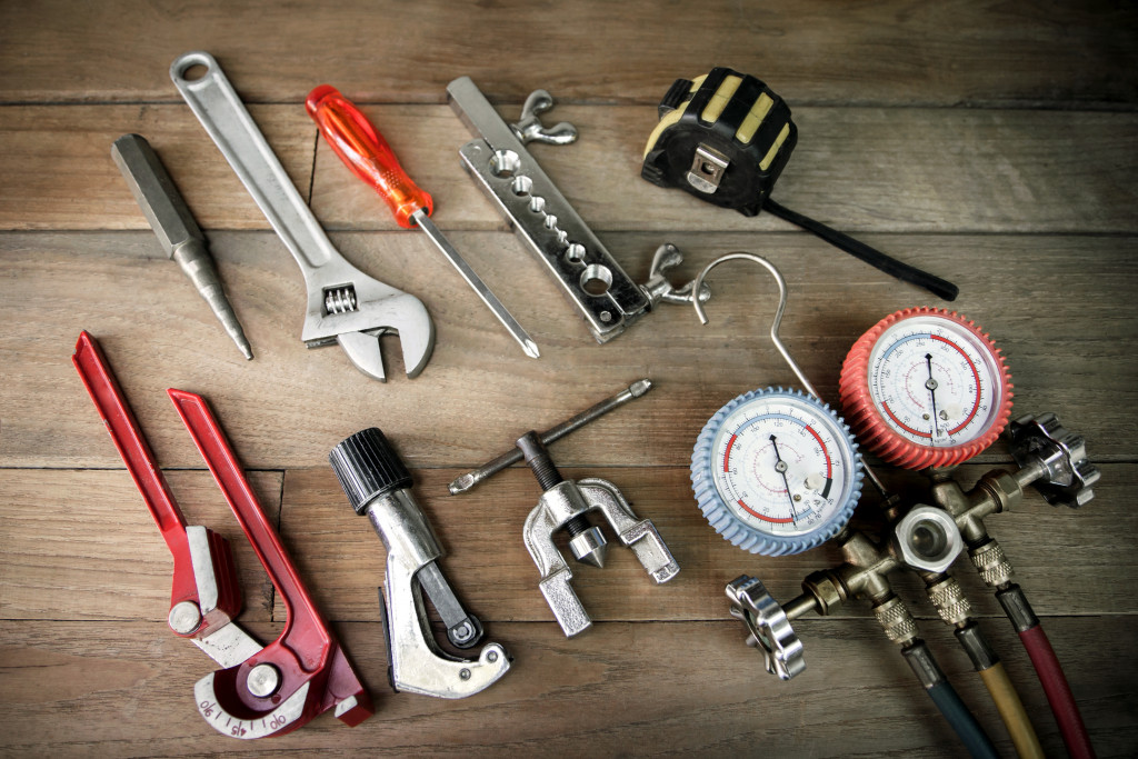 Different vehicle maintenance tools on a table.