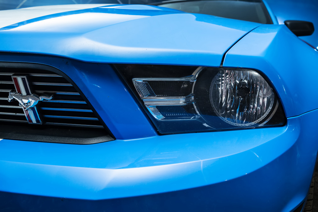 Front of a blue Mustang